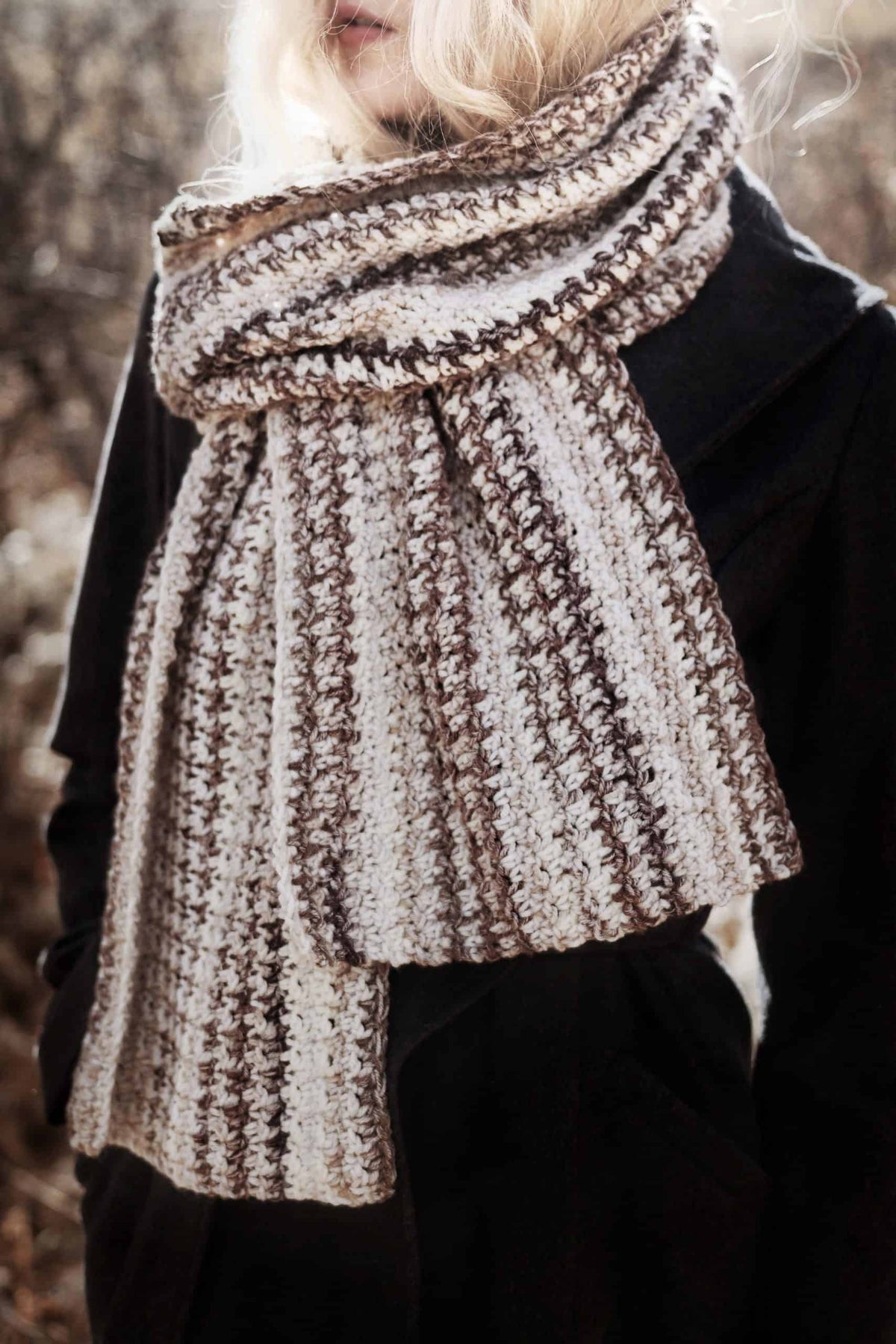 Houndstooth crochet scarf in cream and brown draped elegantly - Meadow Scarf pattern by Darling Jadore
