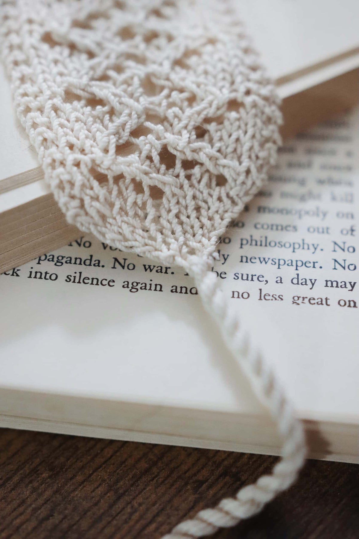 Close-up of vintage-inspired lace knit bookmark showing intricate stitch detail
