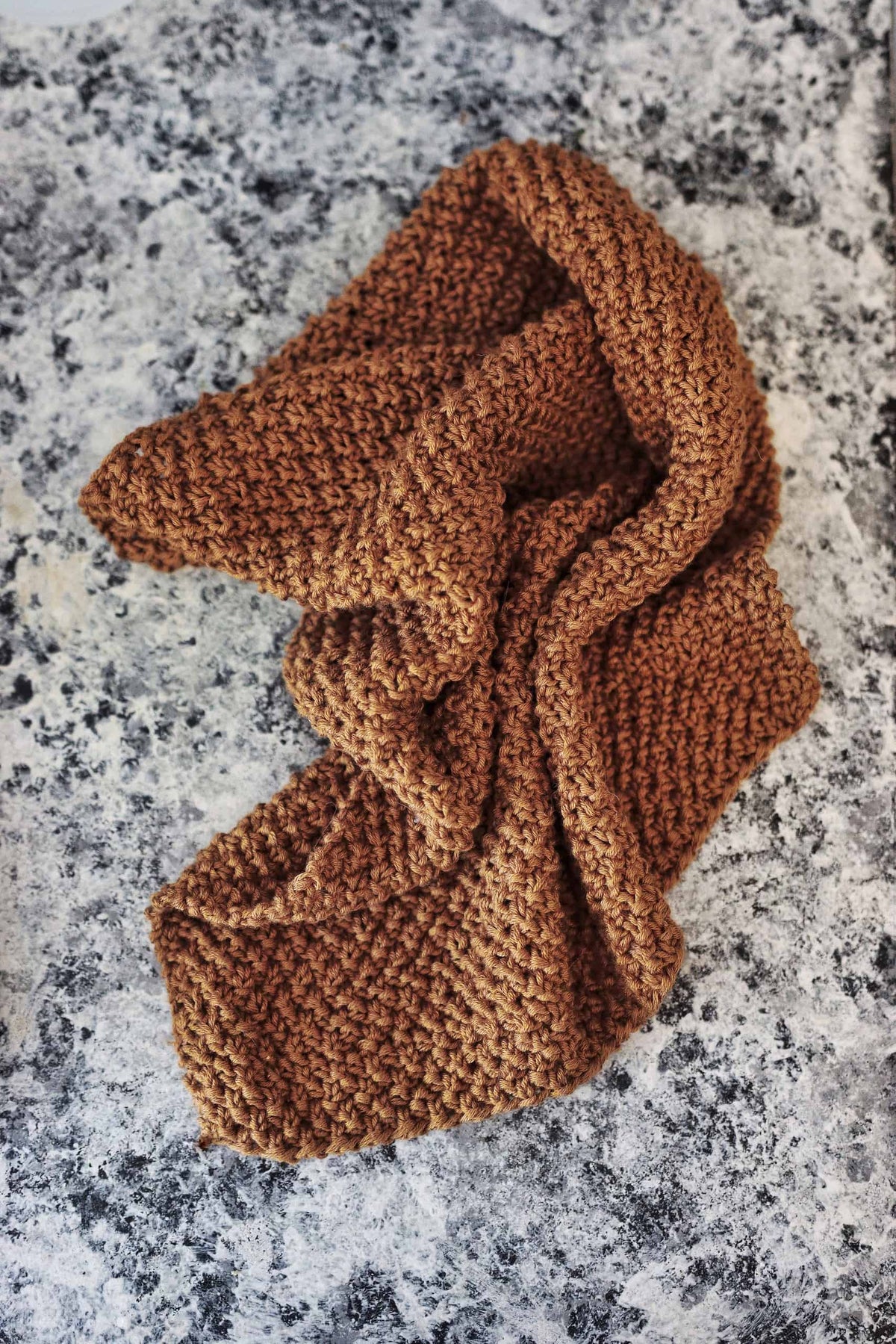Close-up detail of reversible knit tea towel texture showing harmonious stitch pattern on both sides
