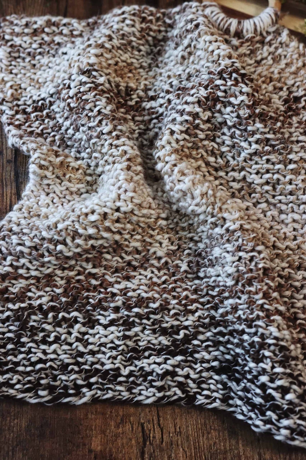 Finished knit hand towel showing plush texture and classic design