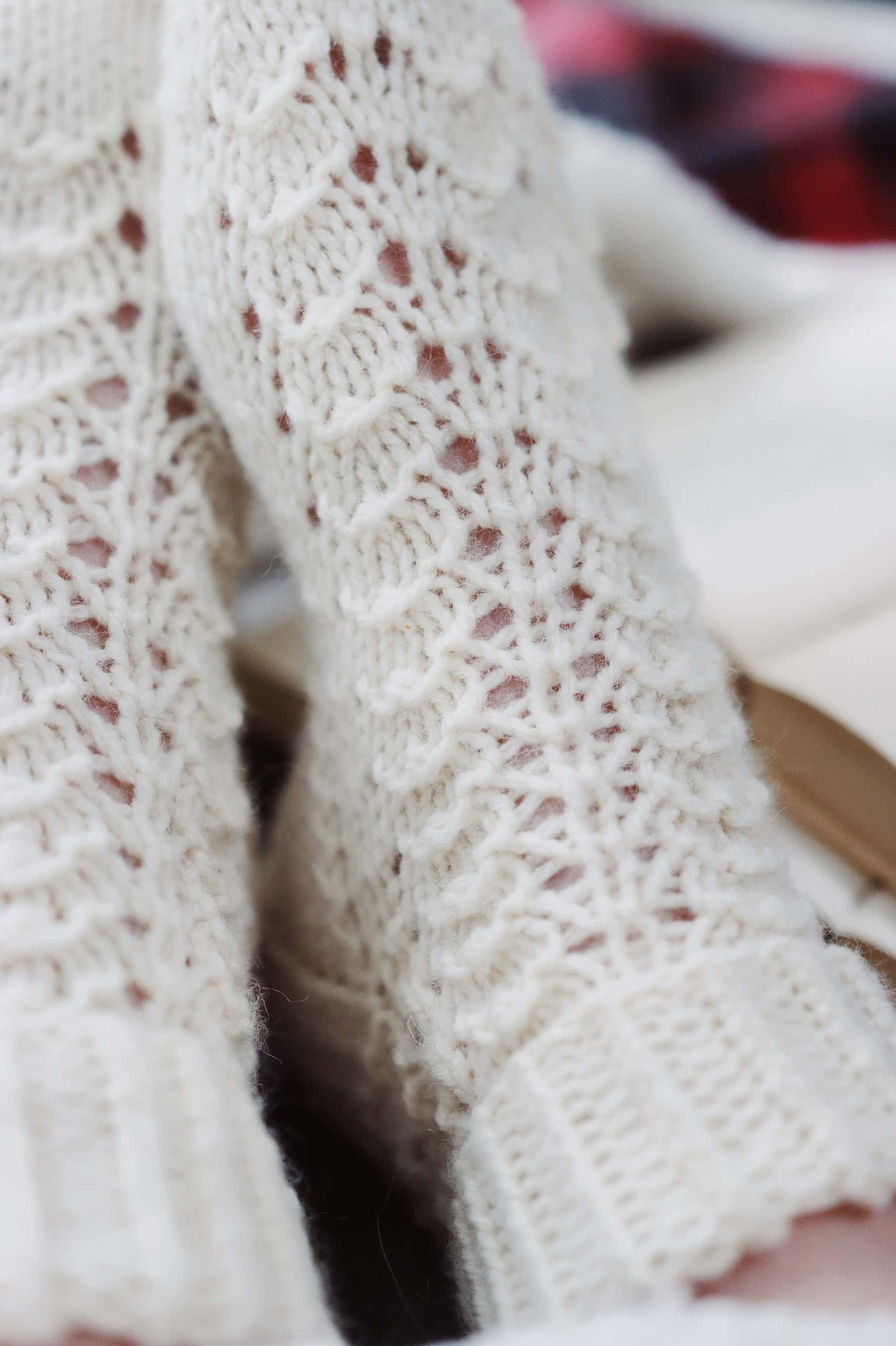 Close up of textured lace knitting pattern detail on Arctic socks cuff
