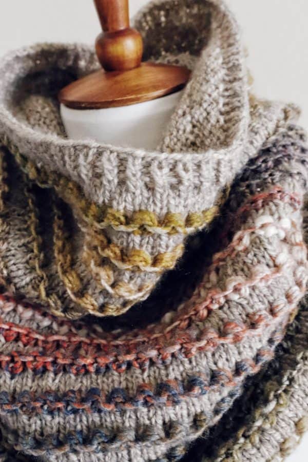 The Rosewood Cowl worn draped showing classic ribbing and stockinette stitch background