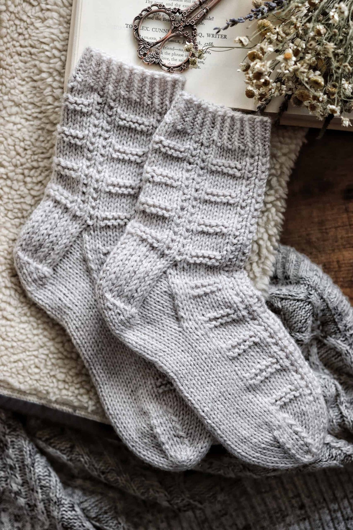 Highland socks knitting pattern worn showing elegant fit and textured design