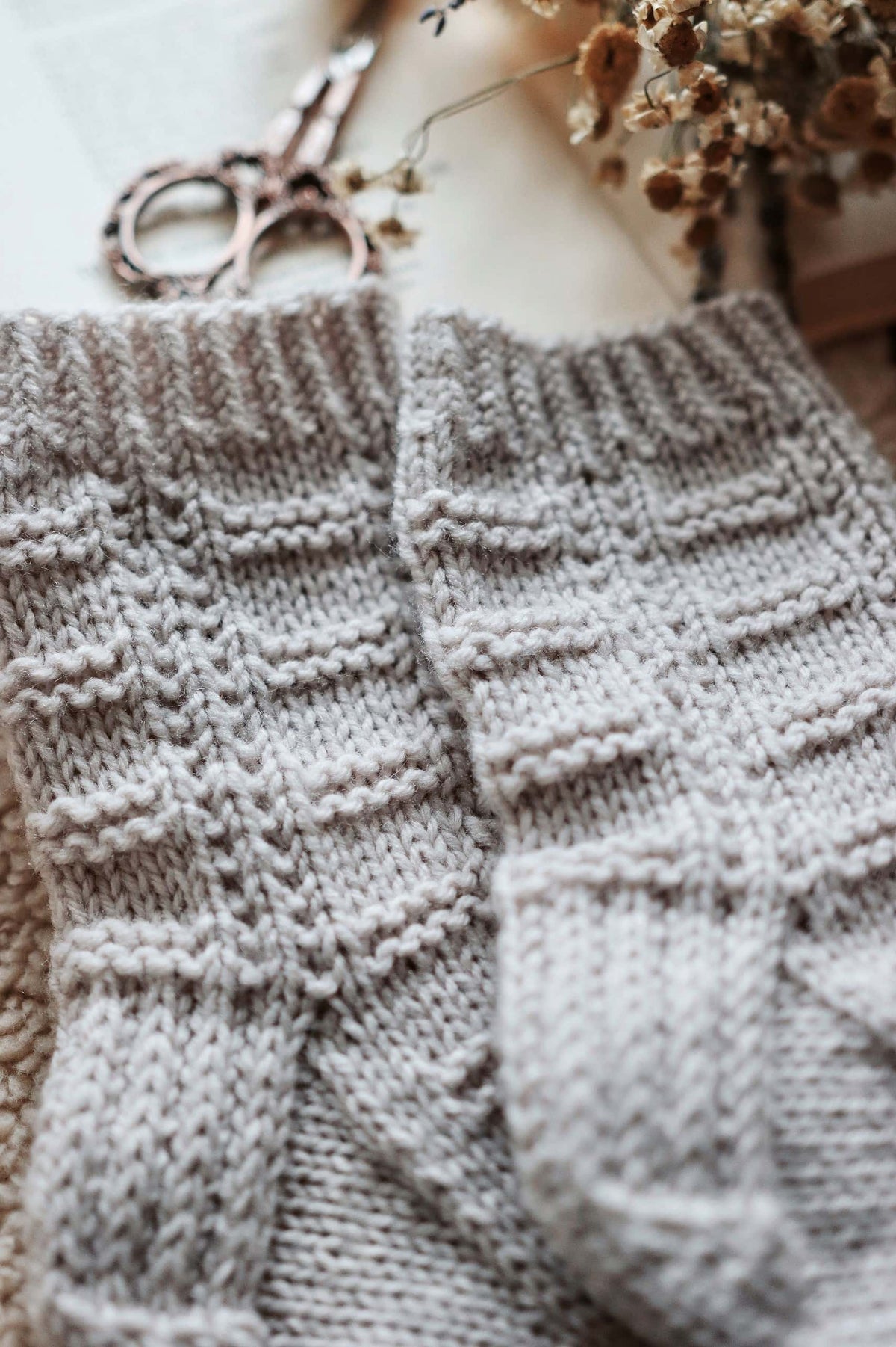 Highland socks knitting pattern detail showing horizontal and vertical ridge texture