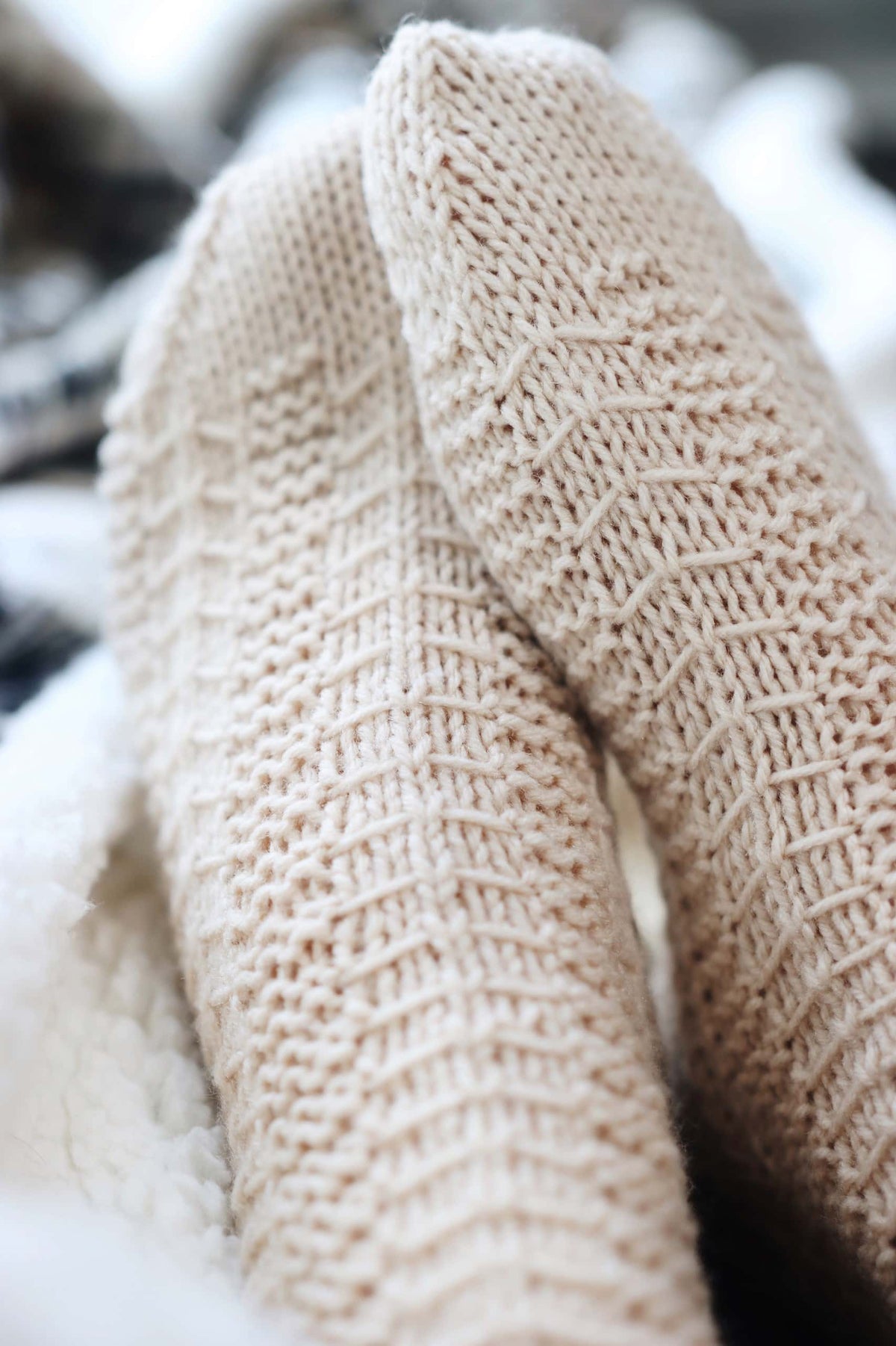 Detailed view of Pinewood socks pattern geometric stitch work in natural light