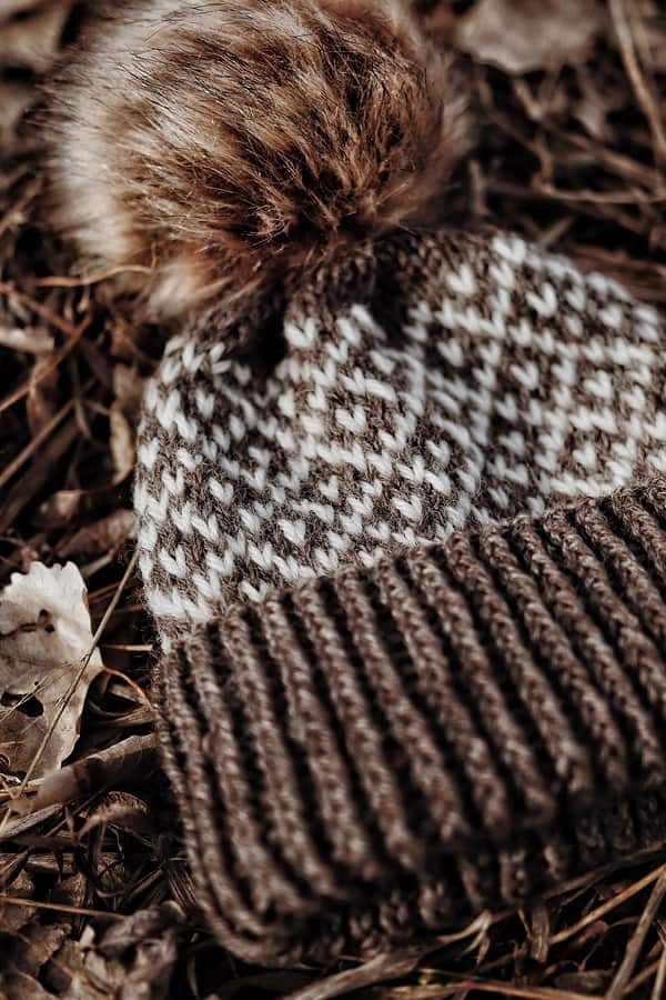 Close up of Dewdrop Beanie showing intricate fair isle diamond colorwork detail