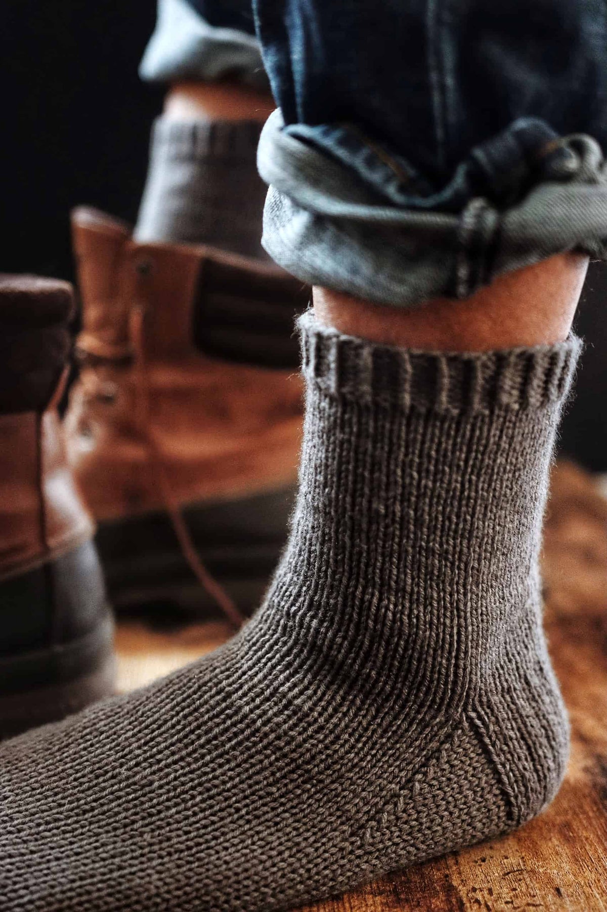 Side view of comfortable boyfriend boot socks in cream DK weight yarn - beginner sock pattern