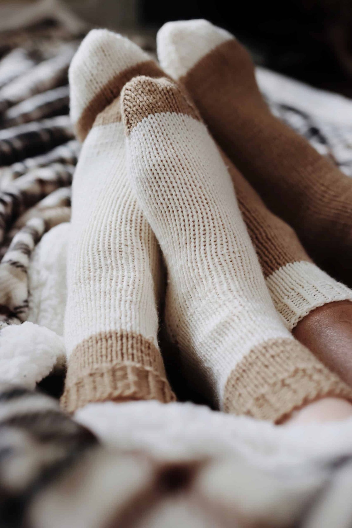 Classic cabin socks knitting pattern detail showing textured stitch work and fit