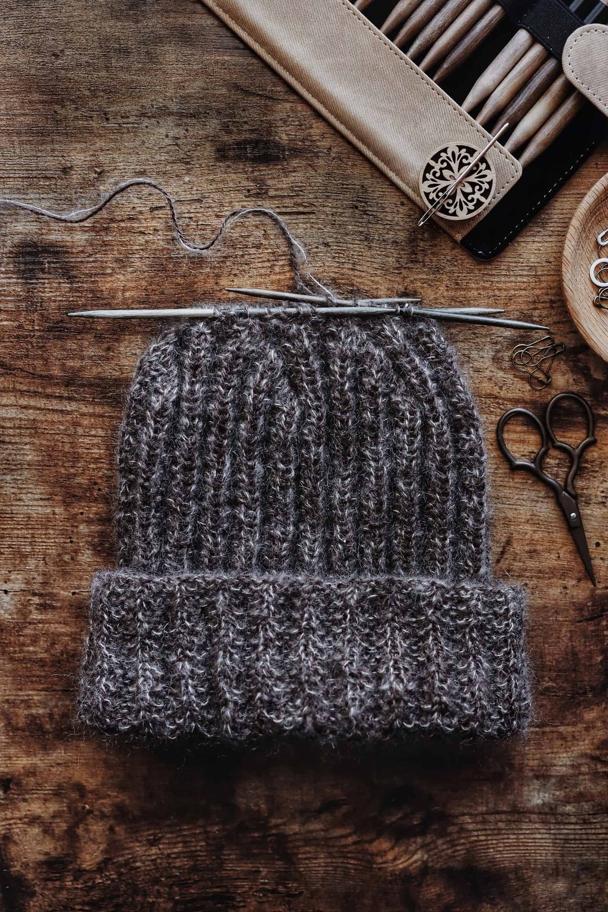 Man wearing The Oakwood ribbed beanie pattern showing classic fit and sophisticated style