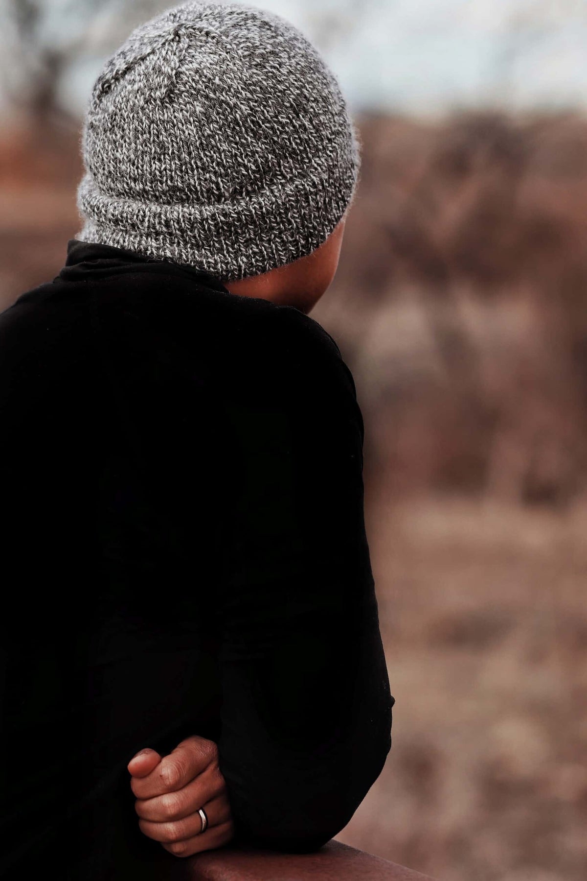 Side view of double brim beanie knitting pattern showing classic fit and warm design