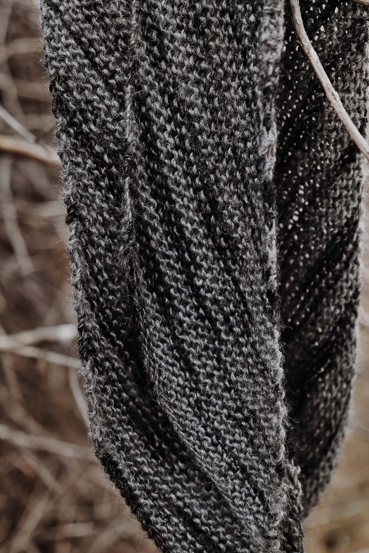 Detail of tapered ends on bias knit mens scarf pattern