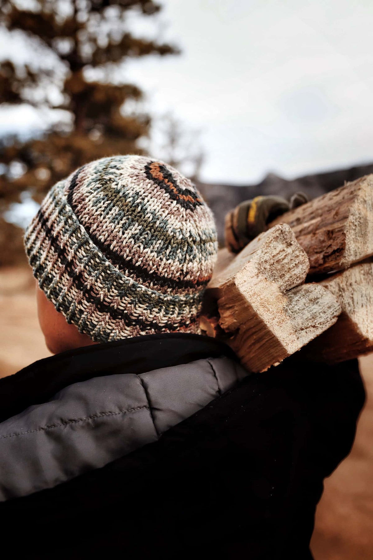 Close up of ribbed knit camo beanie showing fold-over brim detail