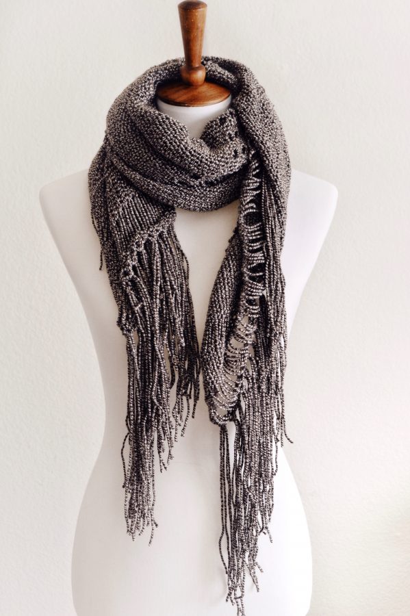 Textured lace border and tassel fringe on handknit Rainfall Shawl pattern