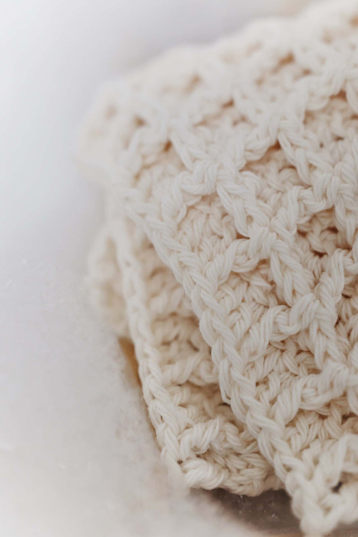 Cottage-style crochet wash cloth pattern detail showing waffle stitch for spa-quality exfoliation