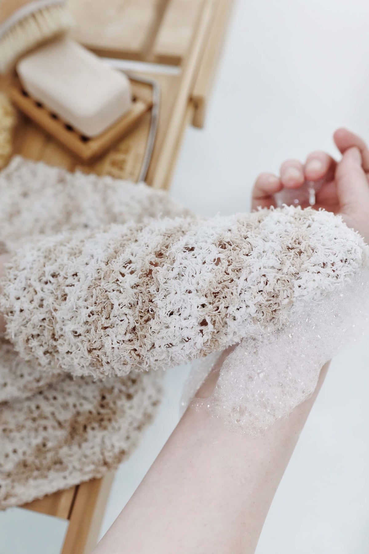 Textured knit wash cloth pattern featuring moss stitch for gentle exfoliation
