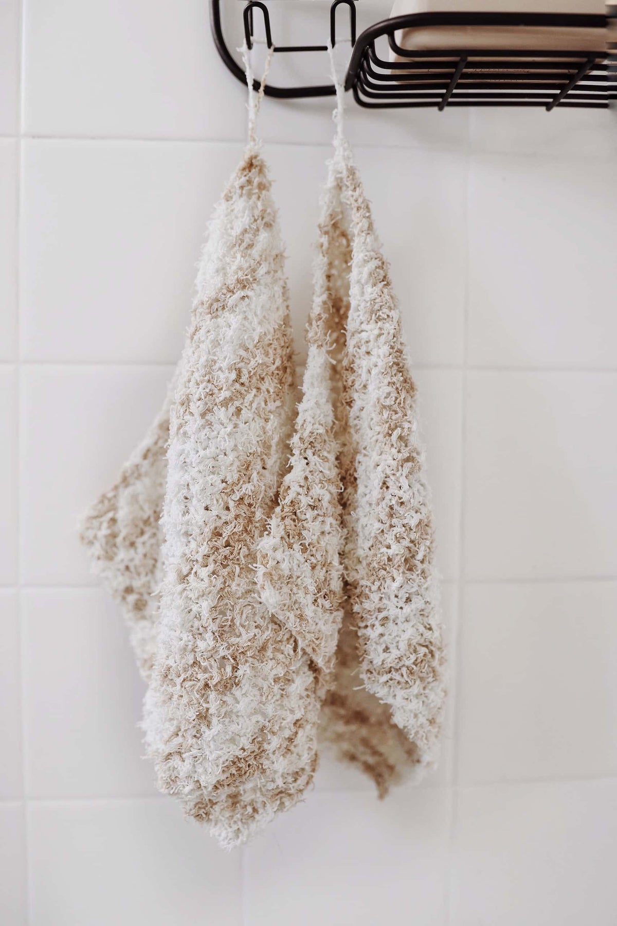 Eco-friendly knit bath mitt and wash cloths set in cream cotton yarn for spa routine