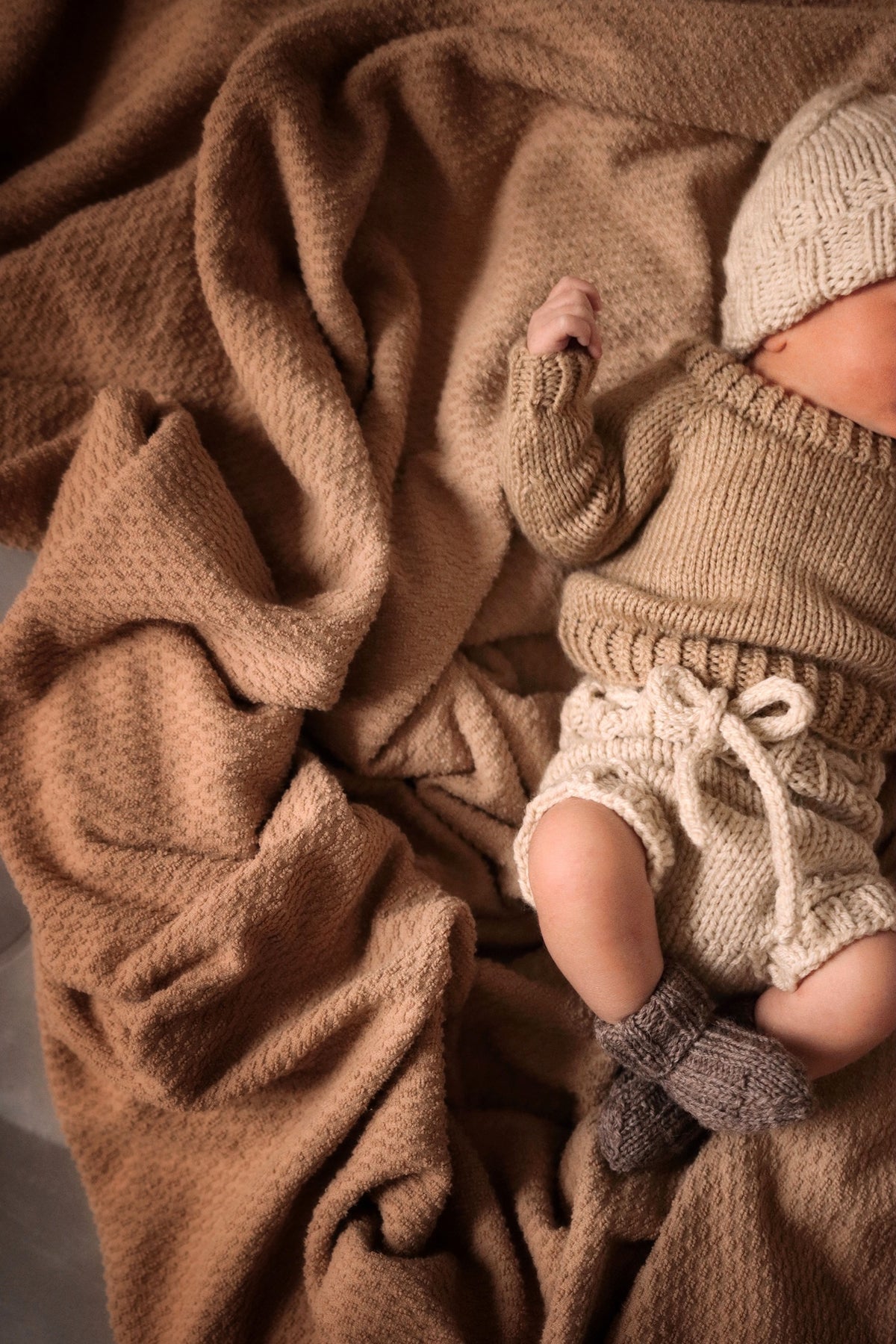 Sweet baby portrait with handmade knit accessories