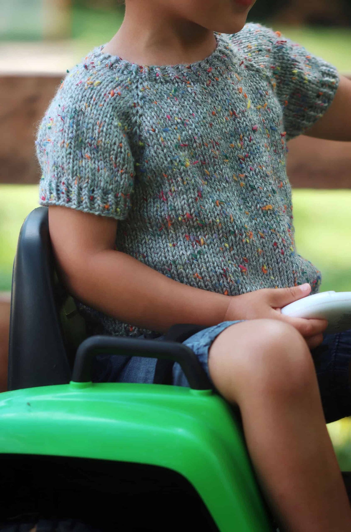 Baby wearing classic cream knit tee shirt from The Tot Tee pattern