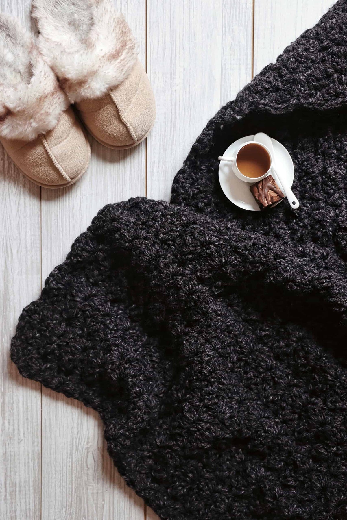 Beginner-friendly chunky crochet blanket pattern with dimensional texture in neutral tones