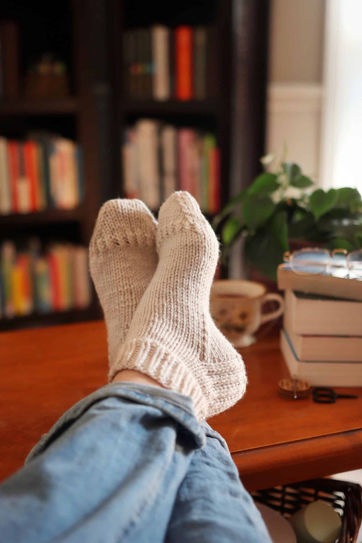 Beginner friendly worsted ankle socks knitting pattern styled with boots