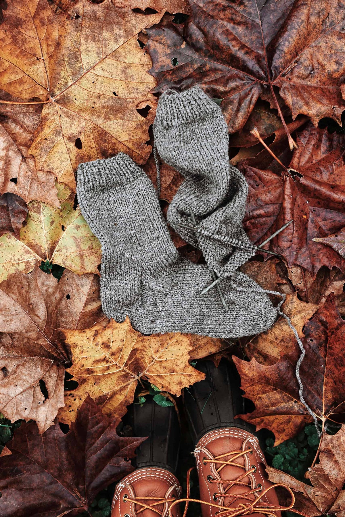 Beginner friendly knit socks pattern in soft cream yarn