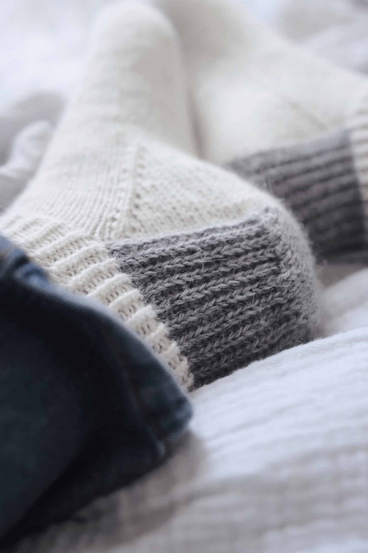 Beginner socks knitting pattern flat lay with yarn and needles