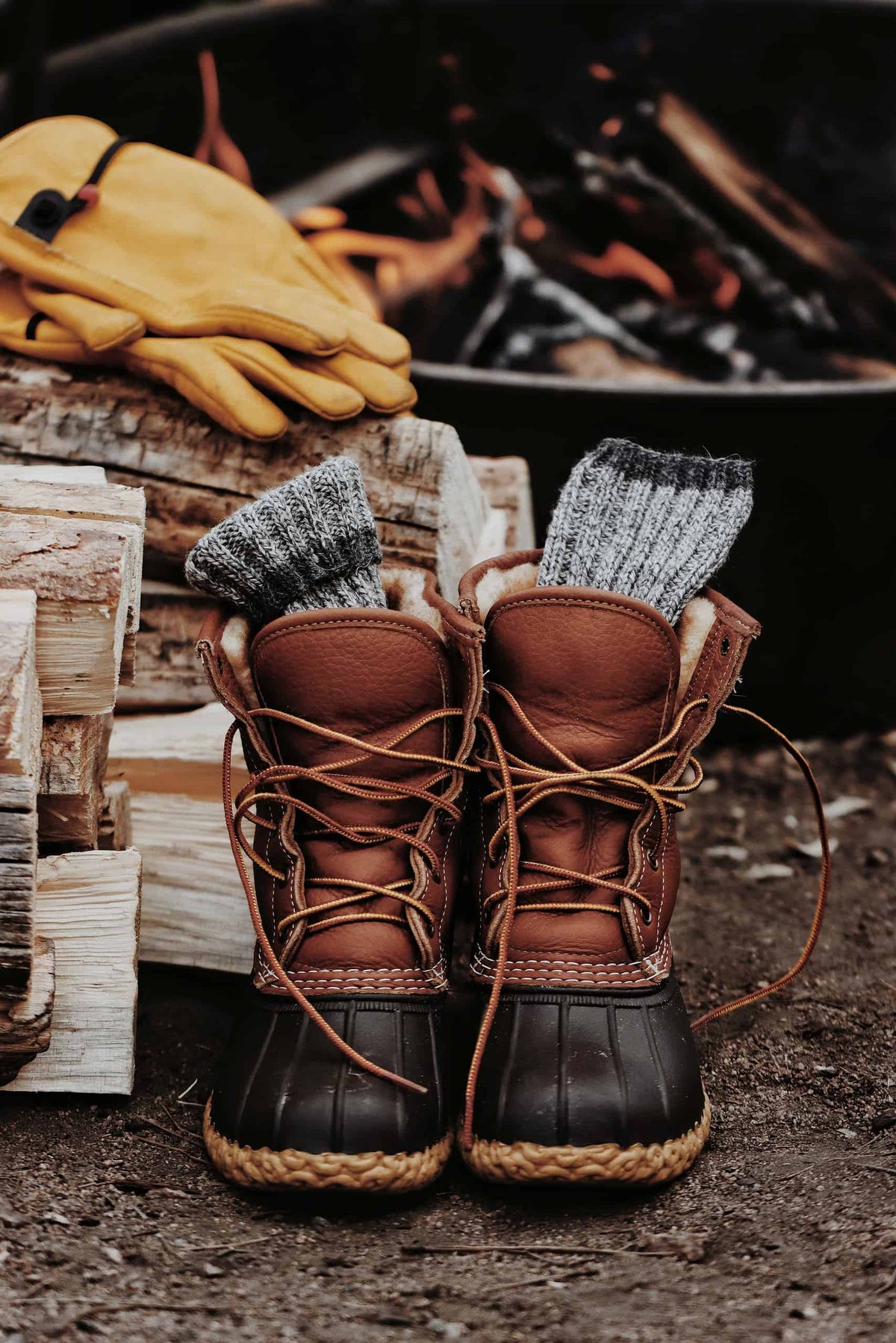The Camp Socks knitting pattern featuring chunky knit boot socks in neutral tones