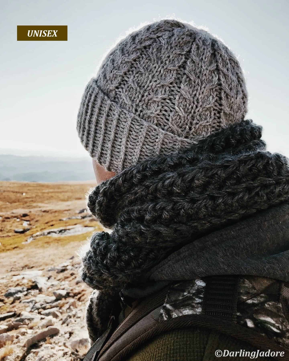 Lakewood cable knit hat knitting pattern worn by model showing elegant all-over cable design