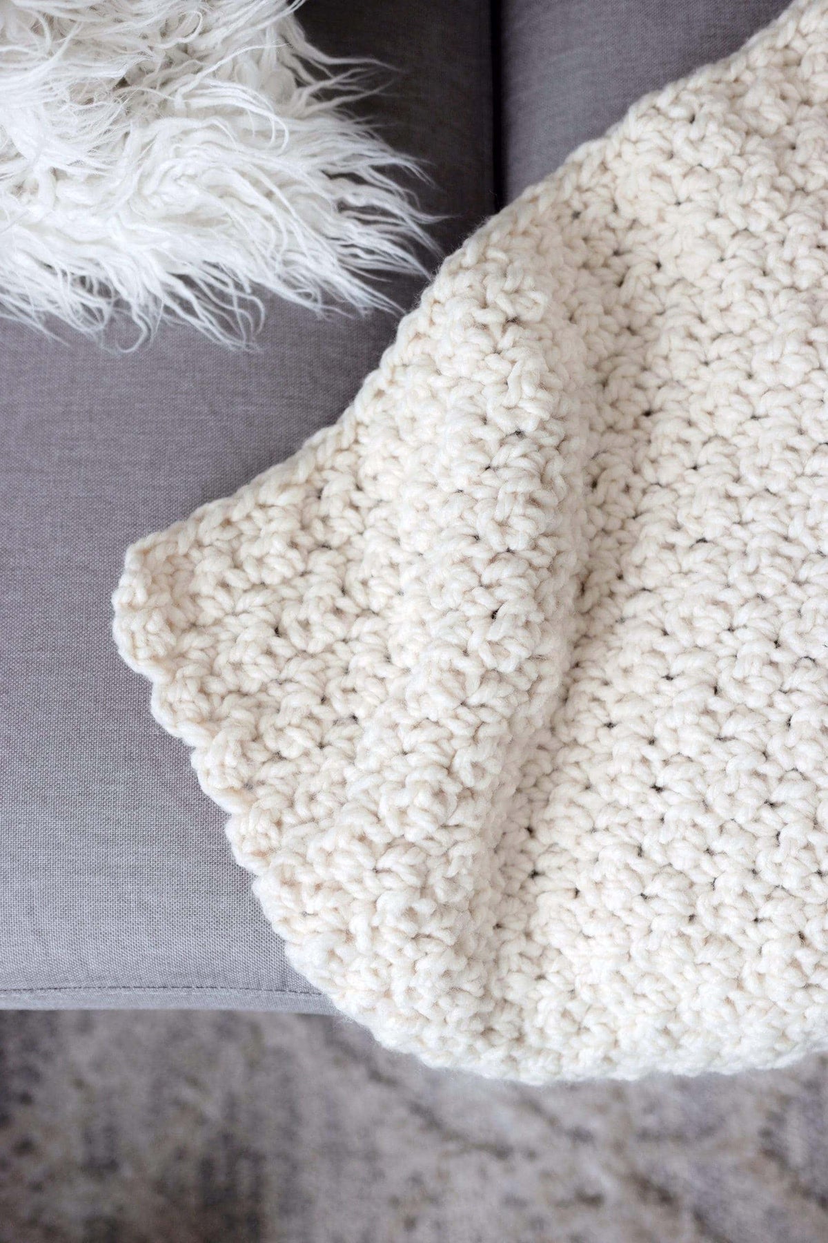 Easy chunky afghan crochet pattern in cream yarn with textured stitches