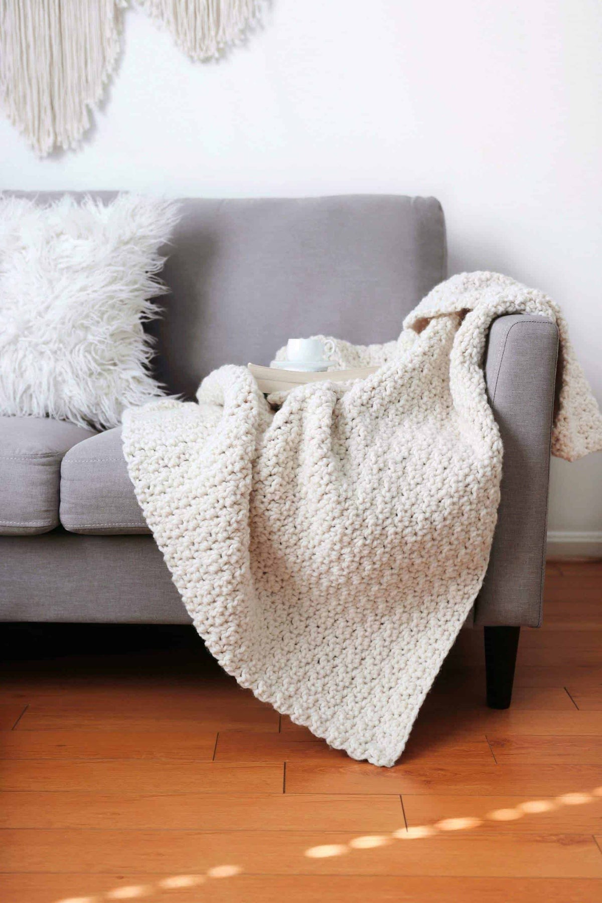 Easy chunky throw blanket crochet pattern with cozy textured surface detail