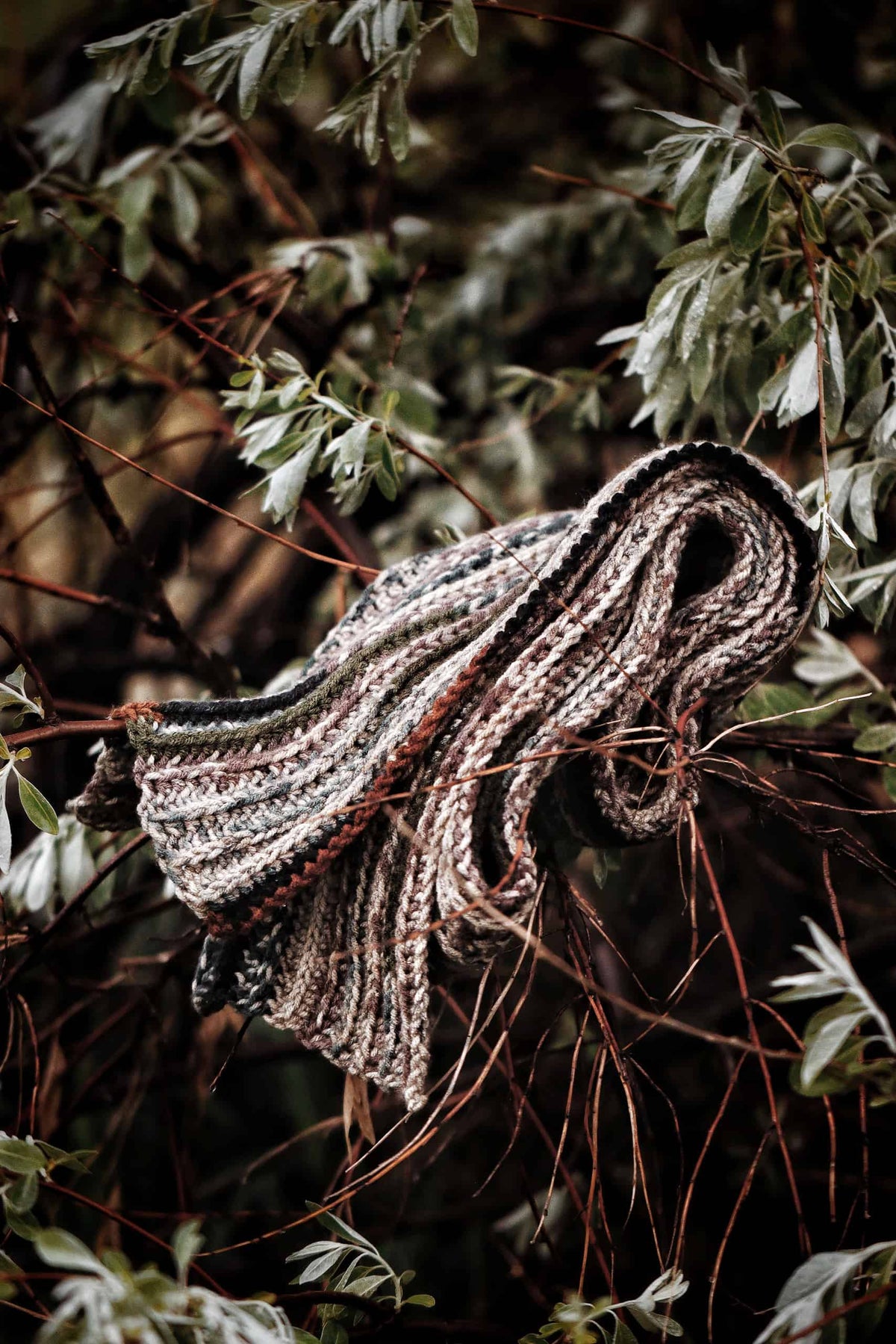 Easy camo scarf crochet pattern showing ribbed stitch detail and drape