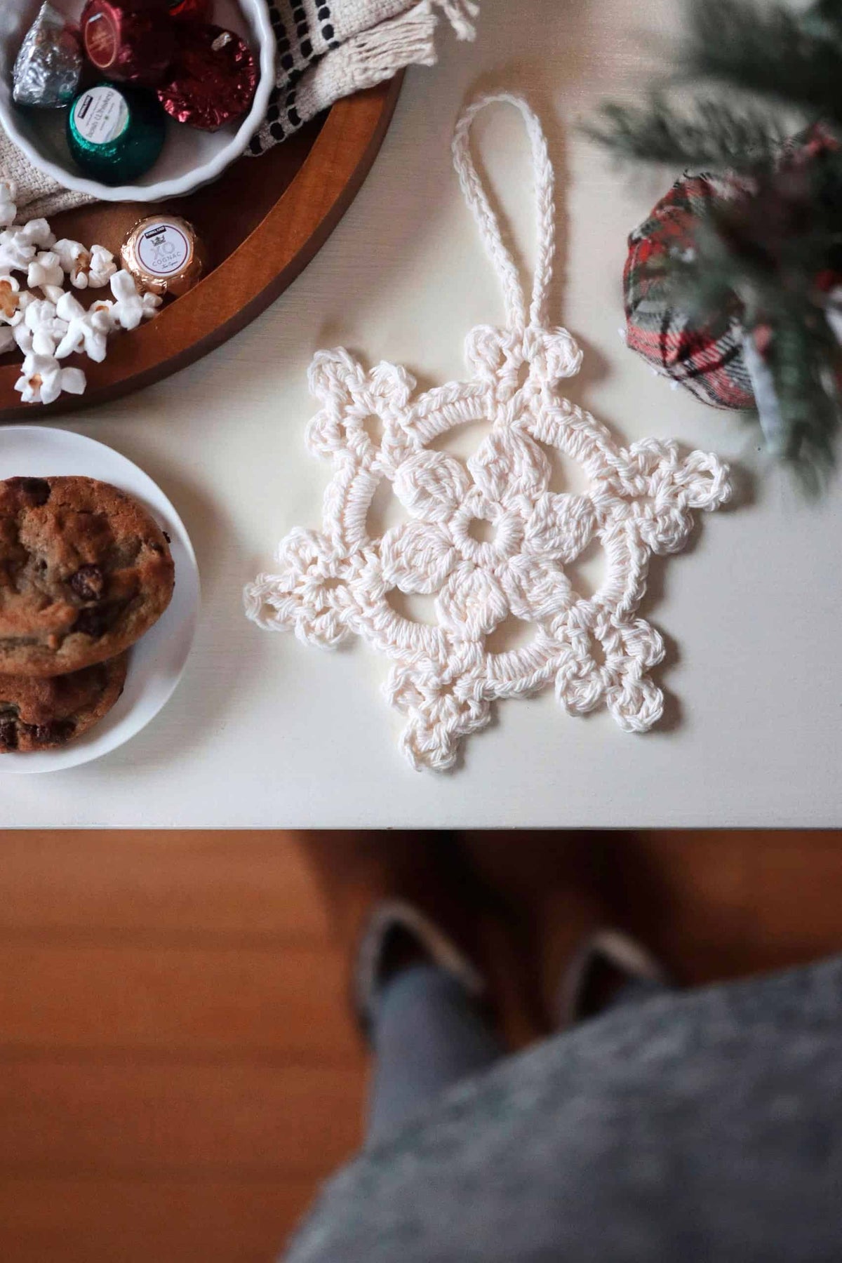 Classic white crochet snowflake ornament with six points and picot edging detail