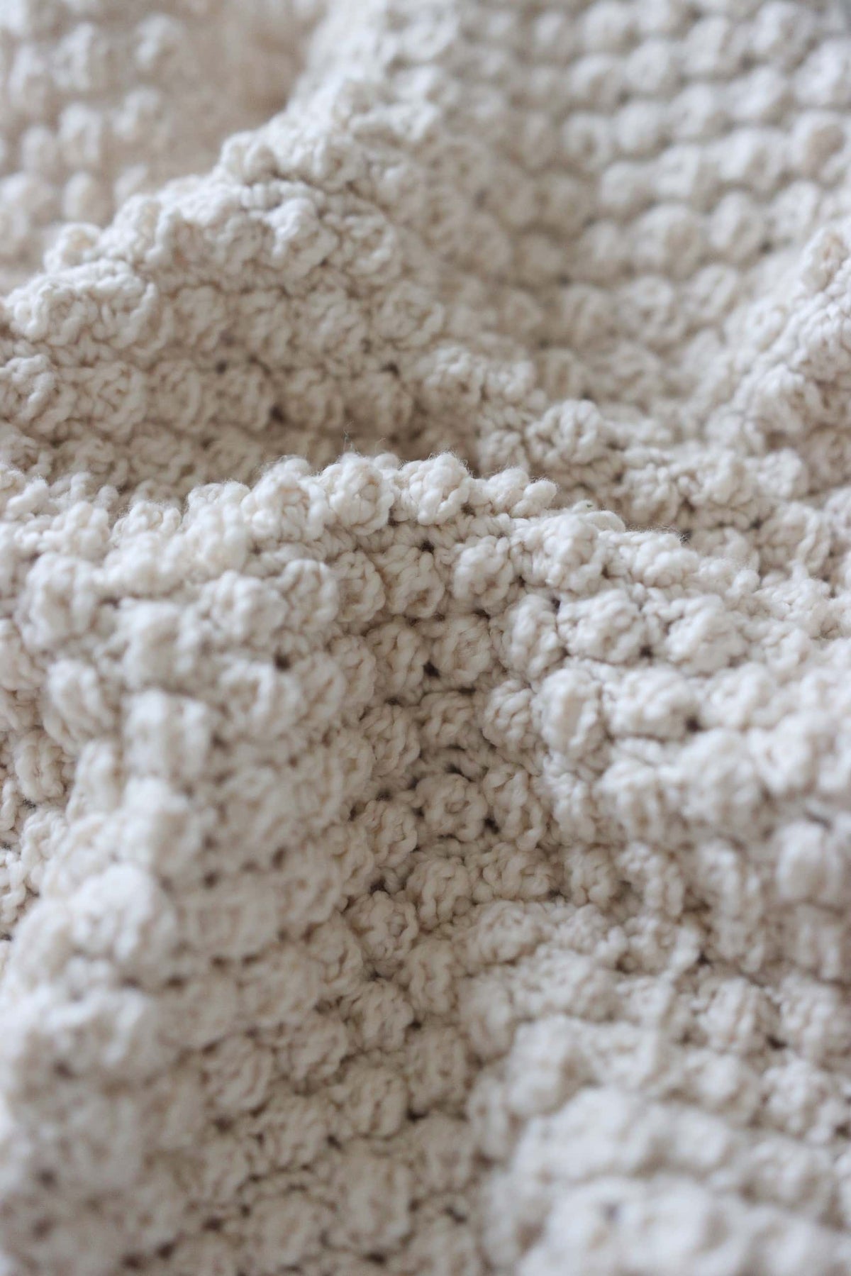 Eco-friendly bobble kitchen towel crochet pattern in neutral cotton yarn with modern texture