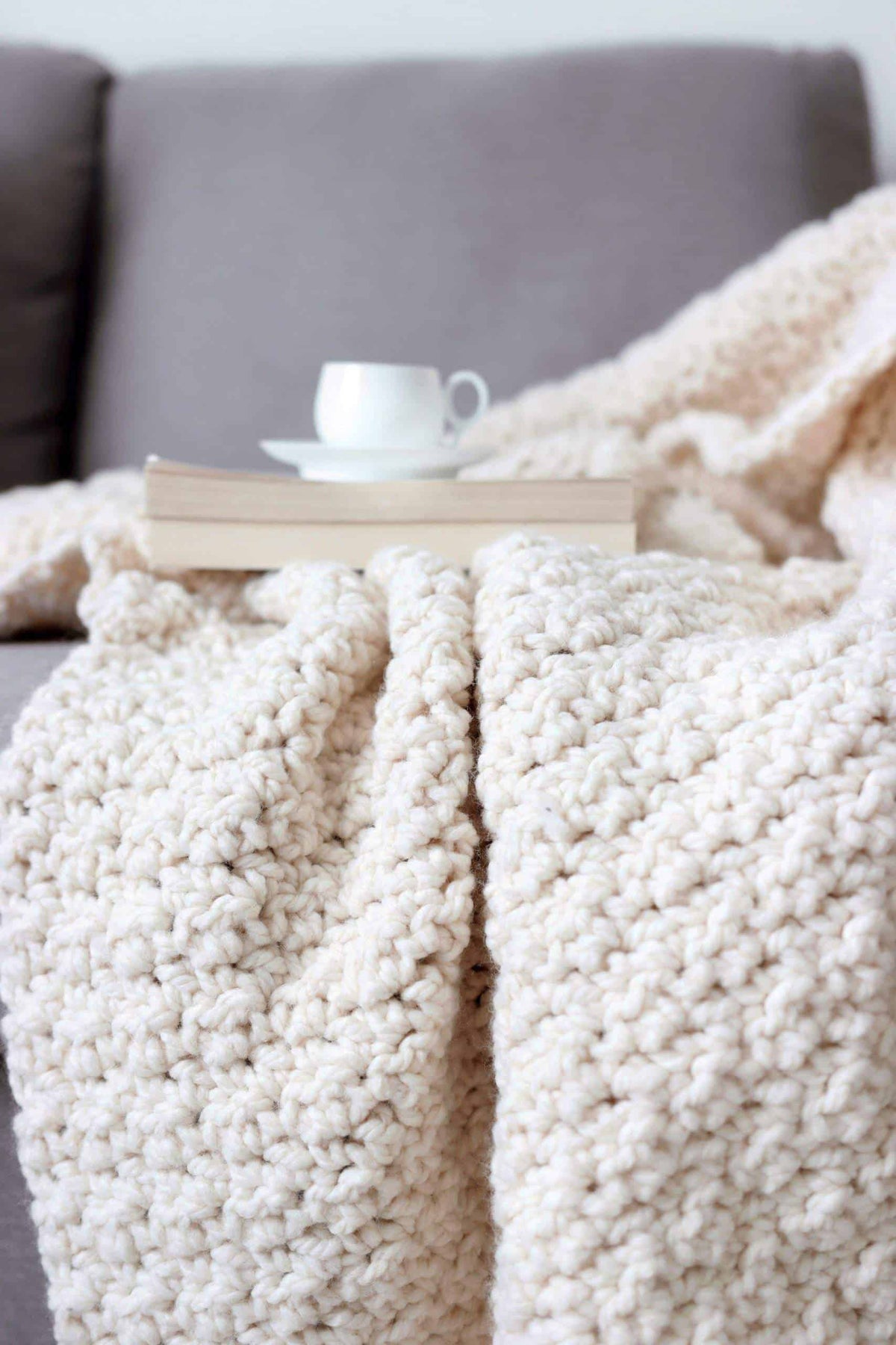 Modern crochet throw pattern in chunky yarn perfect for home decor