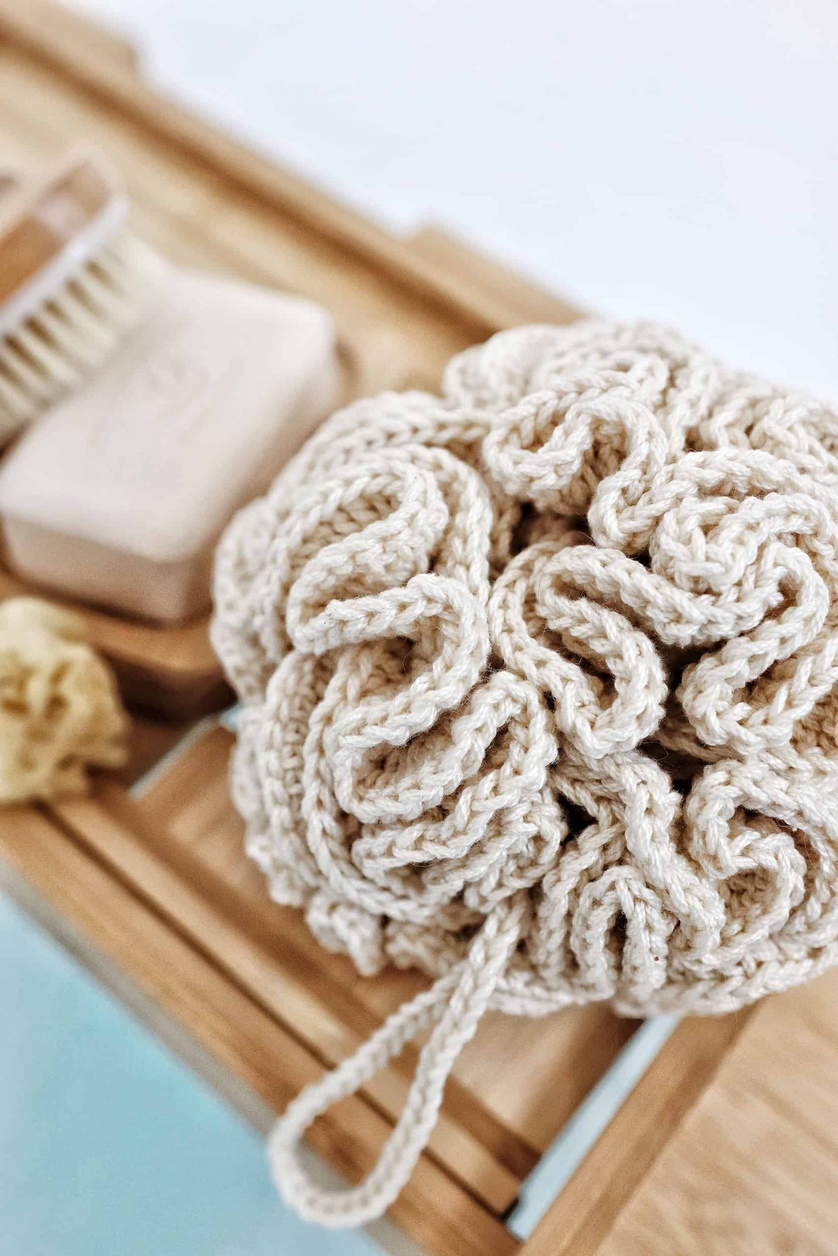 Easy crochet loofah pattern by Darling Jadore for sustainable bath routine
