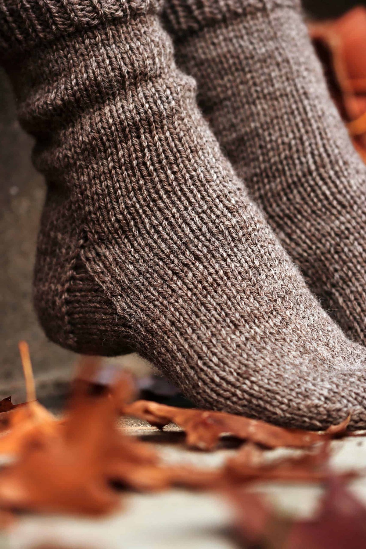Easy beginner socks knitting pattern with clean stockinette texture