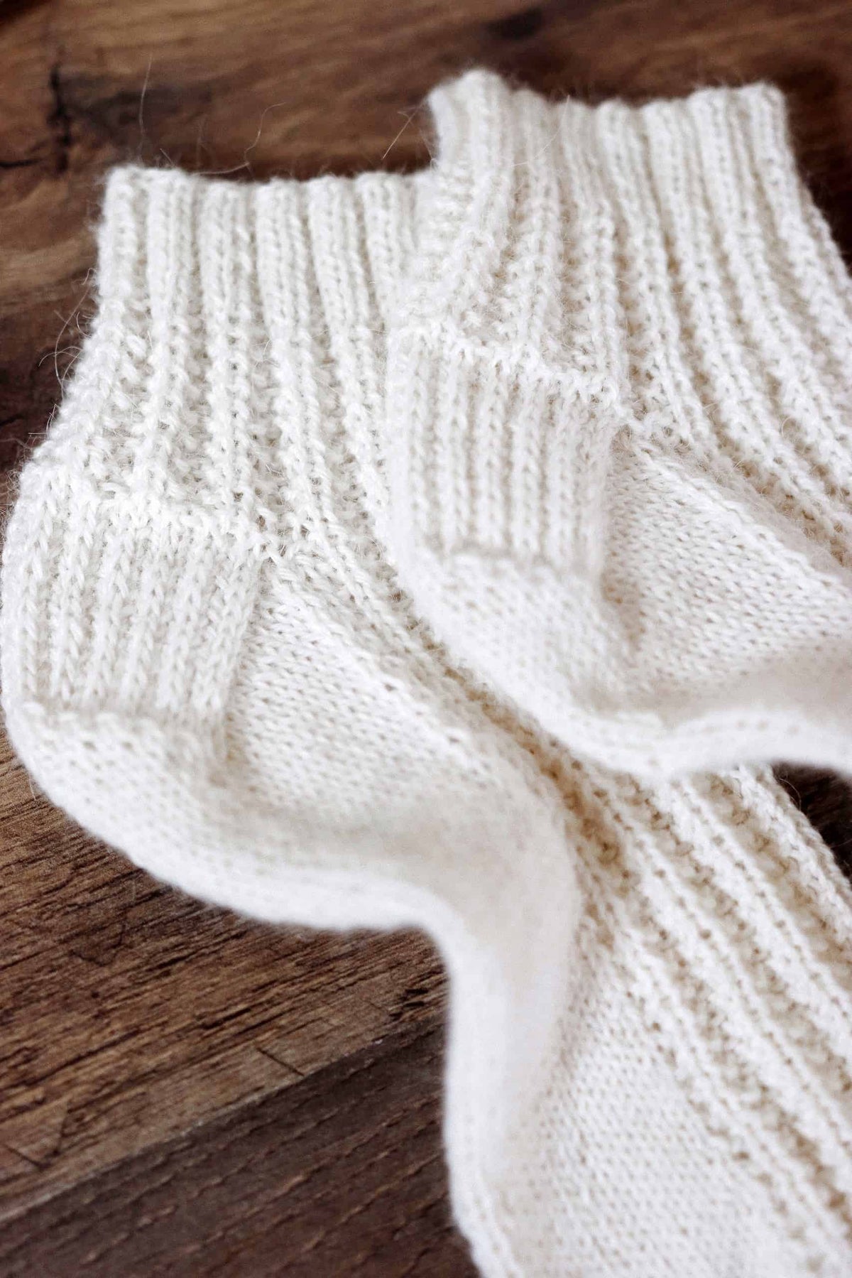 Easy ankle socks knitting pattern finished project on feet