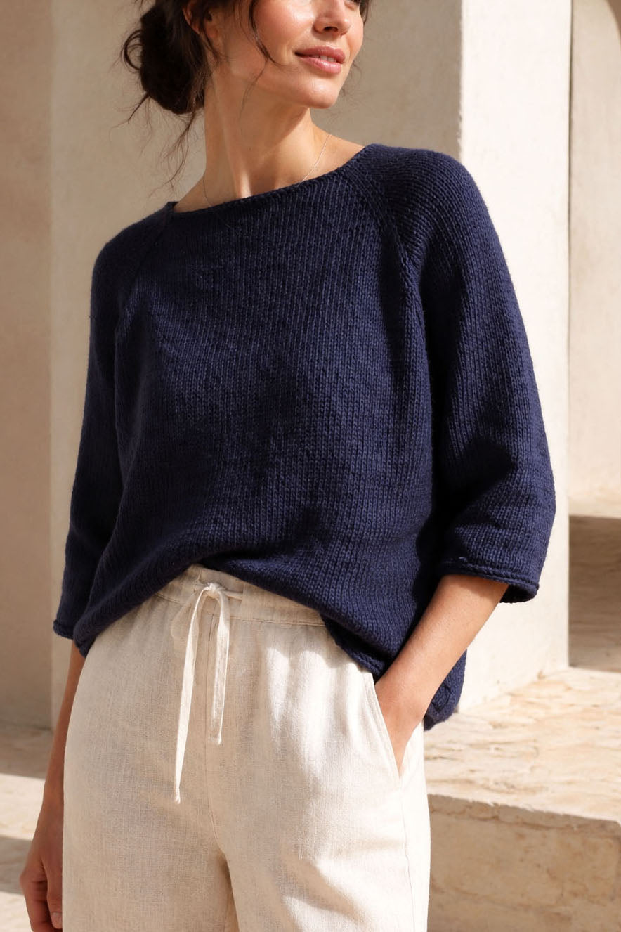 Navy raglan sweater with three-quarter sleeves and cream trousers - The Agate Sweater Knitting Pattern by Darling Jadore