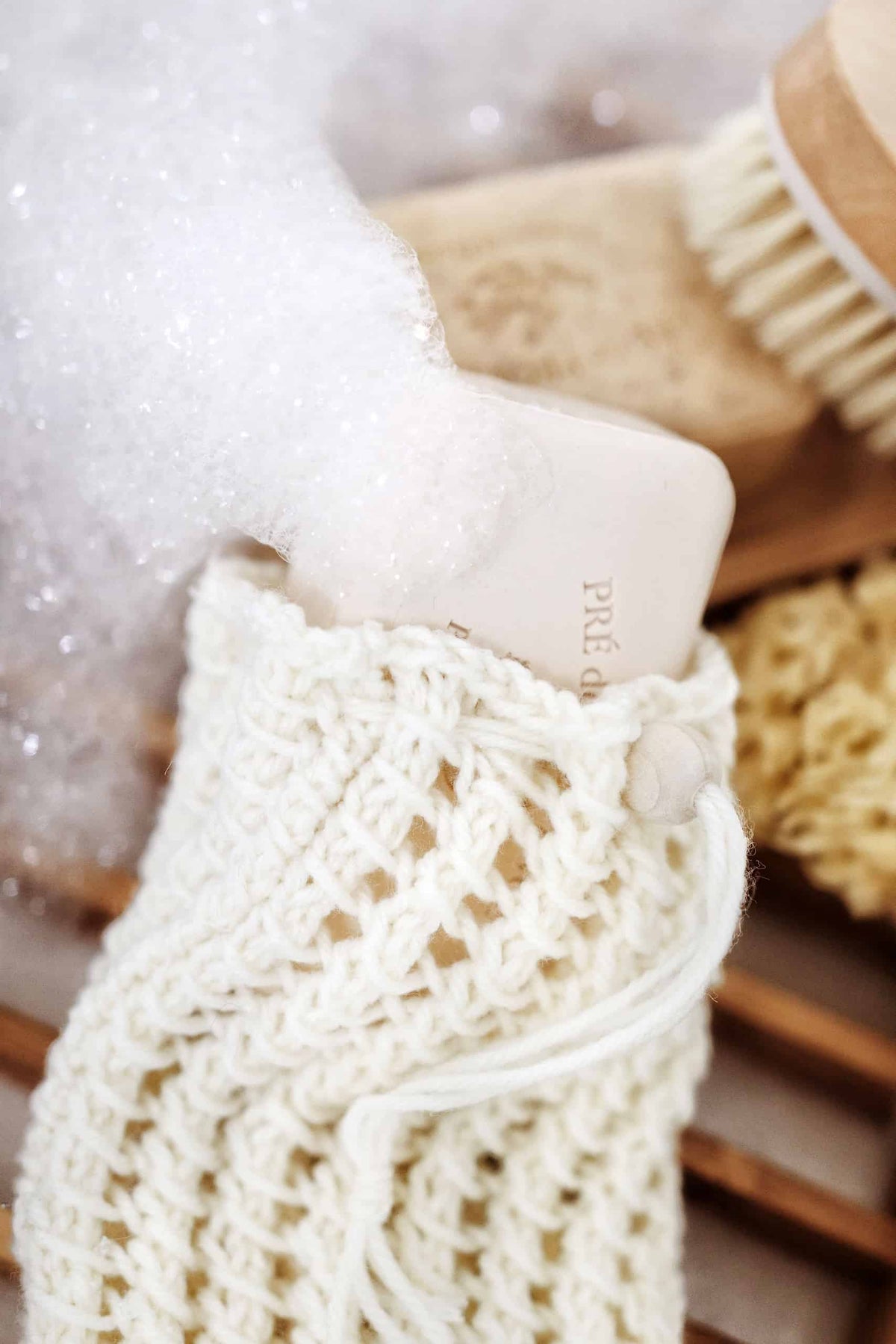Sustainable soap saver bag knitting pattern with natural cotton yarn and eco-friendly design