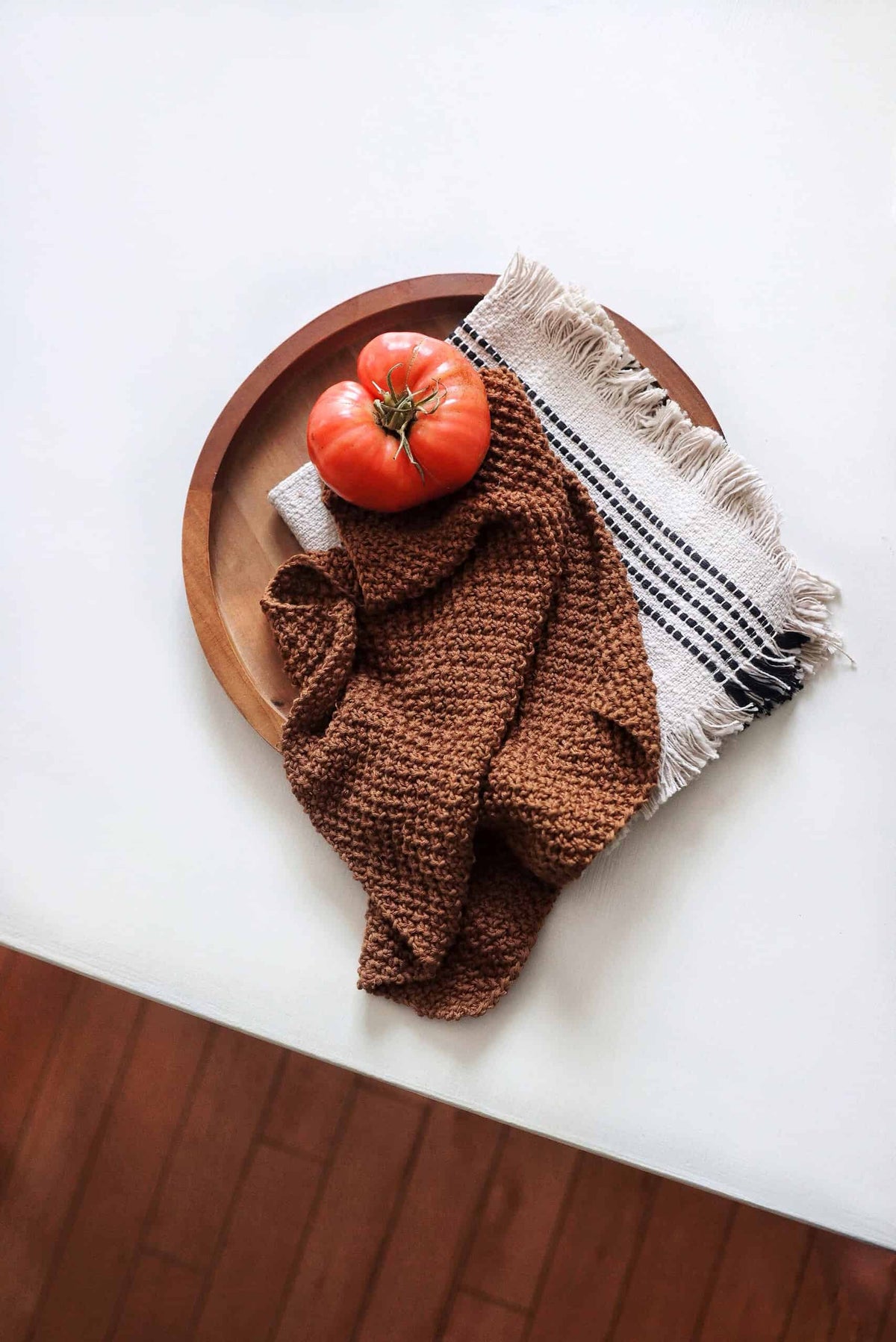 Modern kitchen décor with handknit Kobuk tea towel pattern in neutral tones - beginner friendly design
