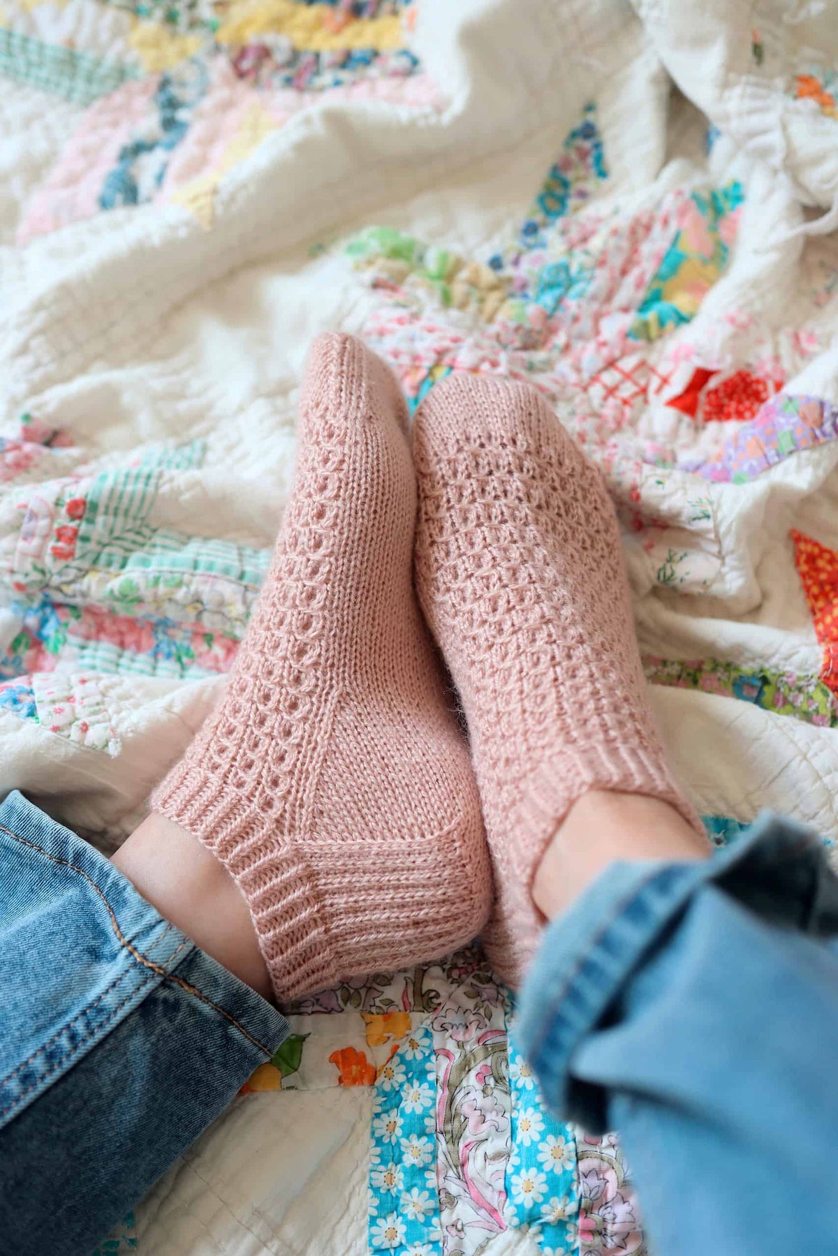 Handknit lacy shortie socks pattern with flowing swirl motif