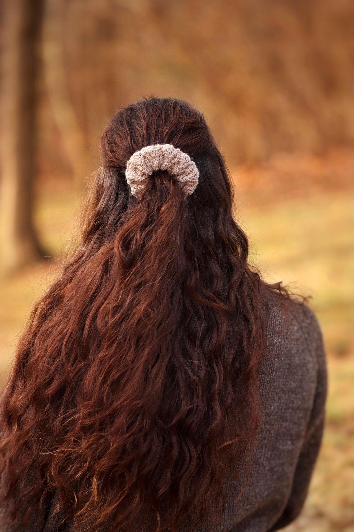 Knit lace scrunchie pattern detail showing airy romantic texture in sock weight yarn