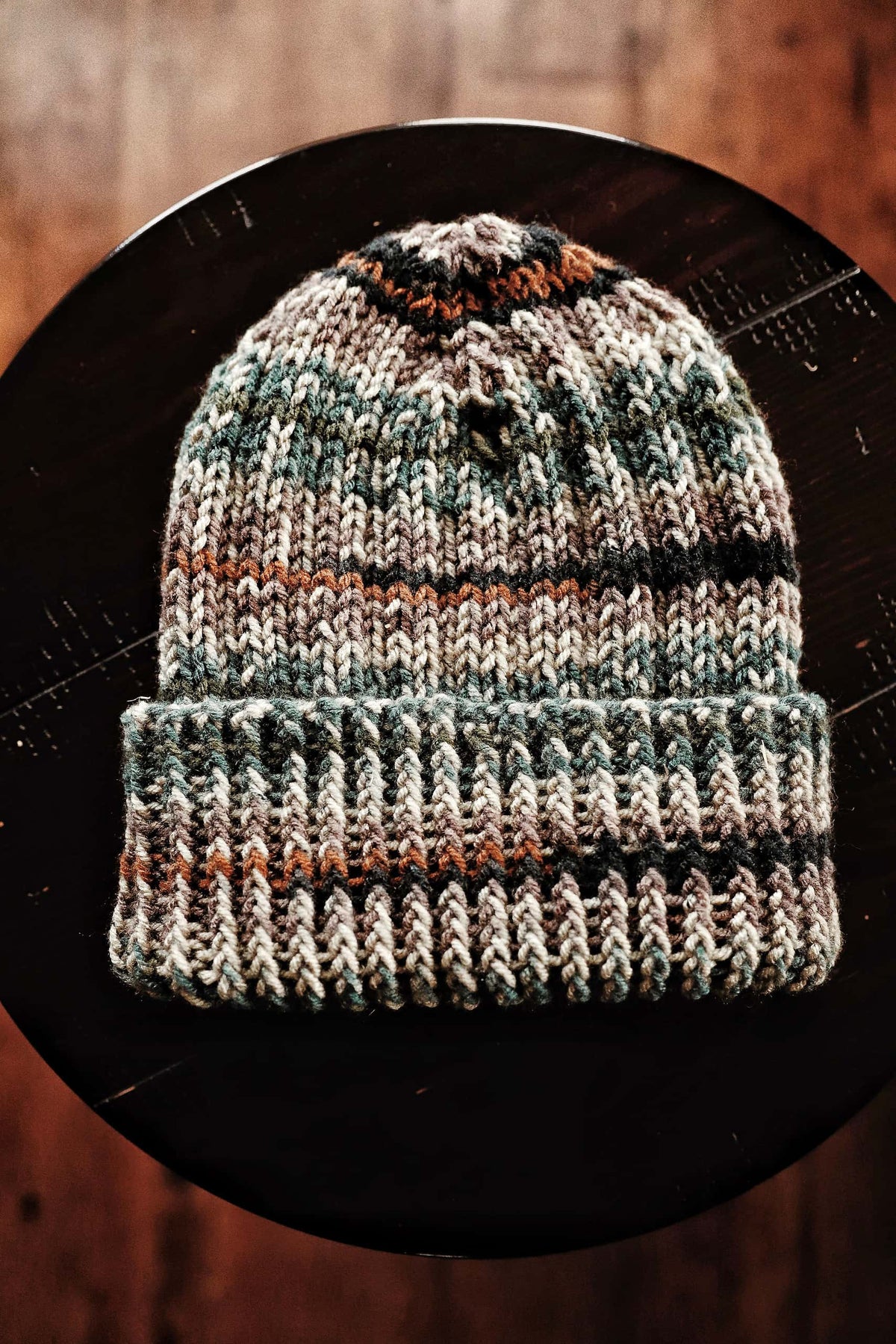 Hand knit camo beanie in camouflage yarn with ribbed texture