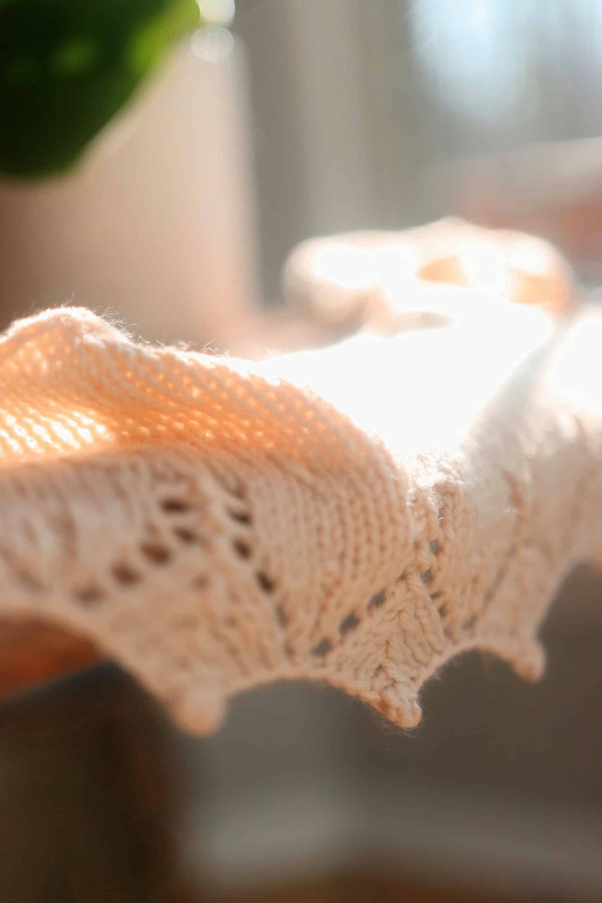 Small crescent scarf with vintage-inspired lace edging from Bay Scarf knitting pattern