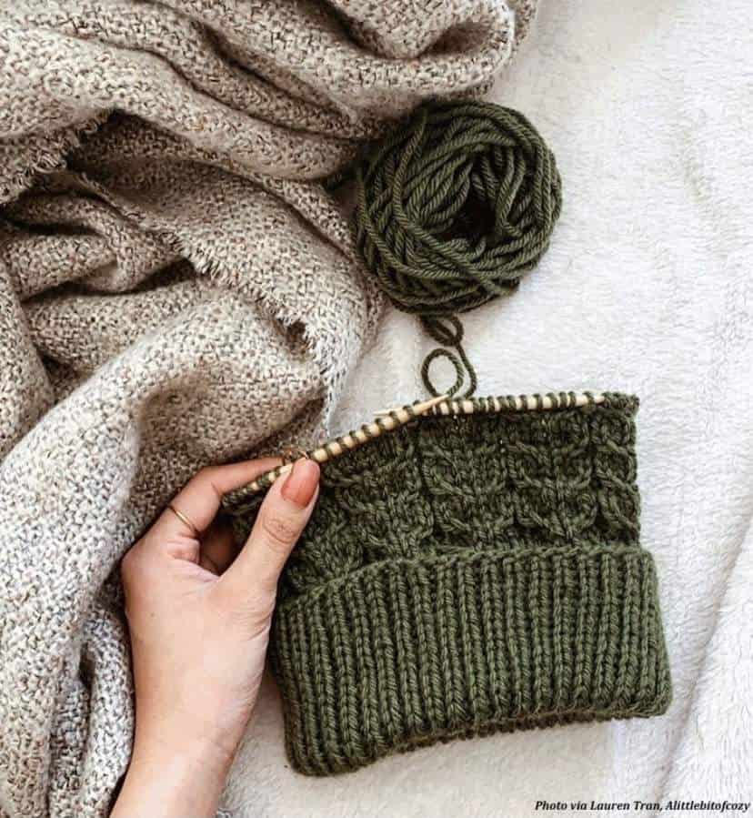 Lakewood beanie knitting pattern cover showing finished cable hat with timeless design