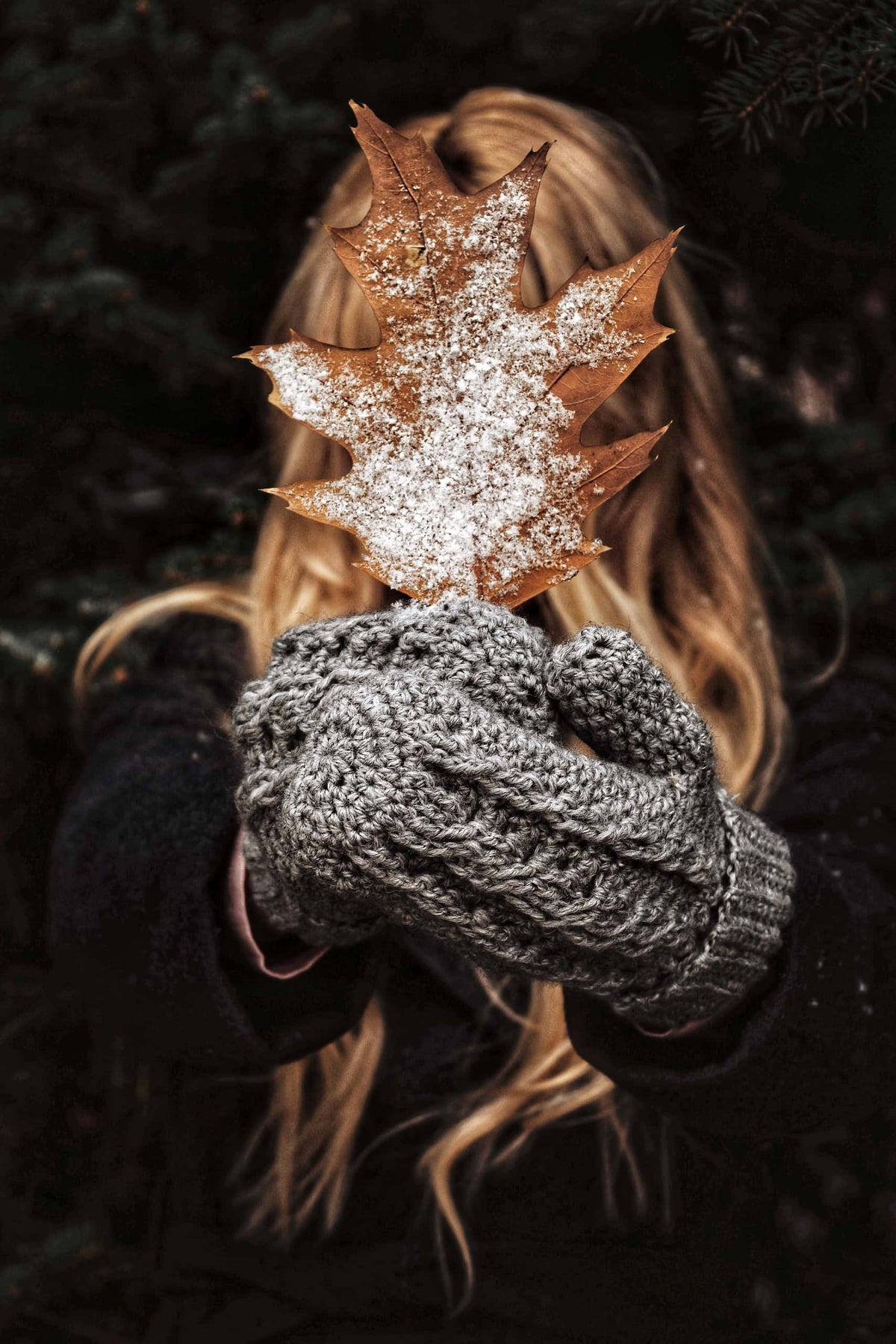 Driftwood cable mittens crochet pattern showing flowing cable texture and ribbed detail