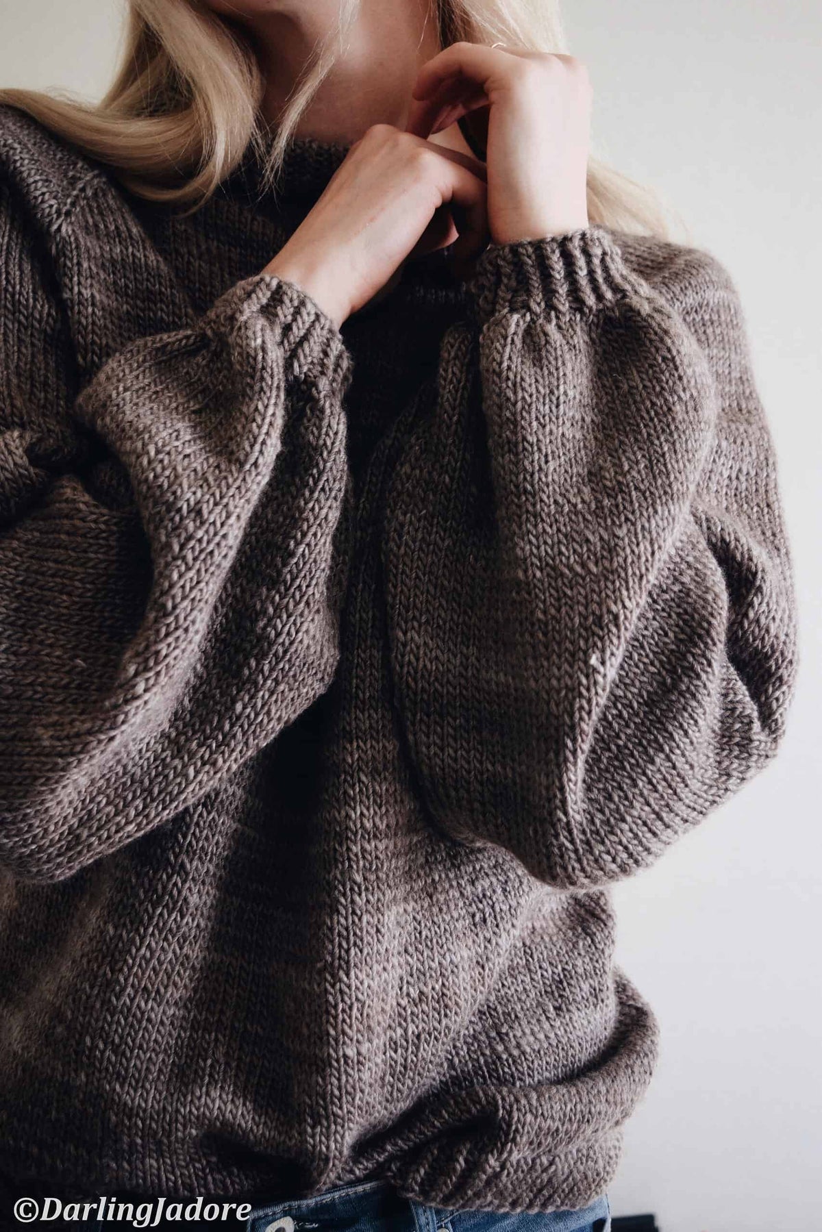 Back detail of Posy sweater knitting pattern featuring graceful keyhole and ribbon ties