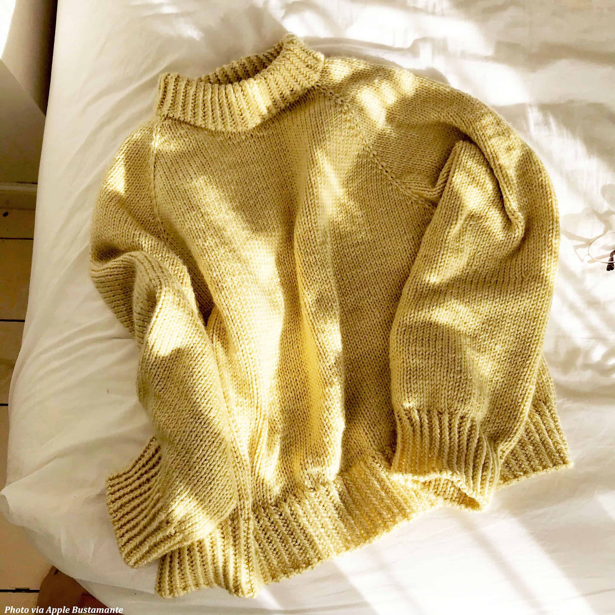 Top-down raglan sweater knitting pattern with seamless construction