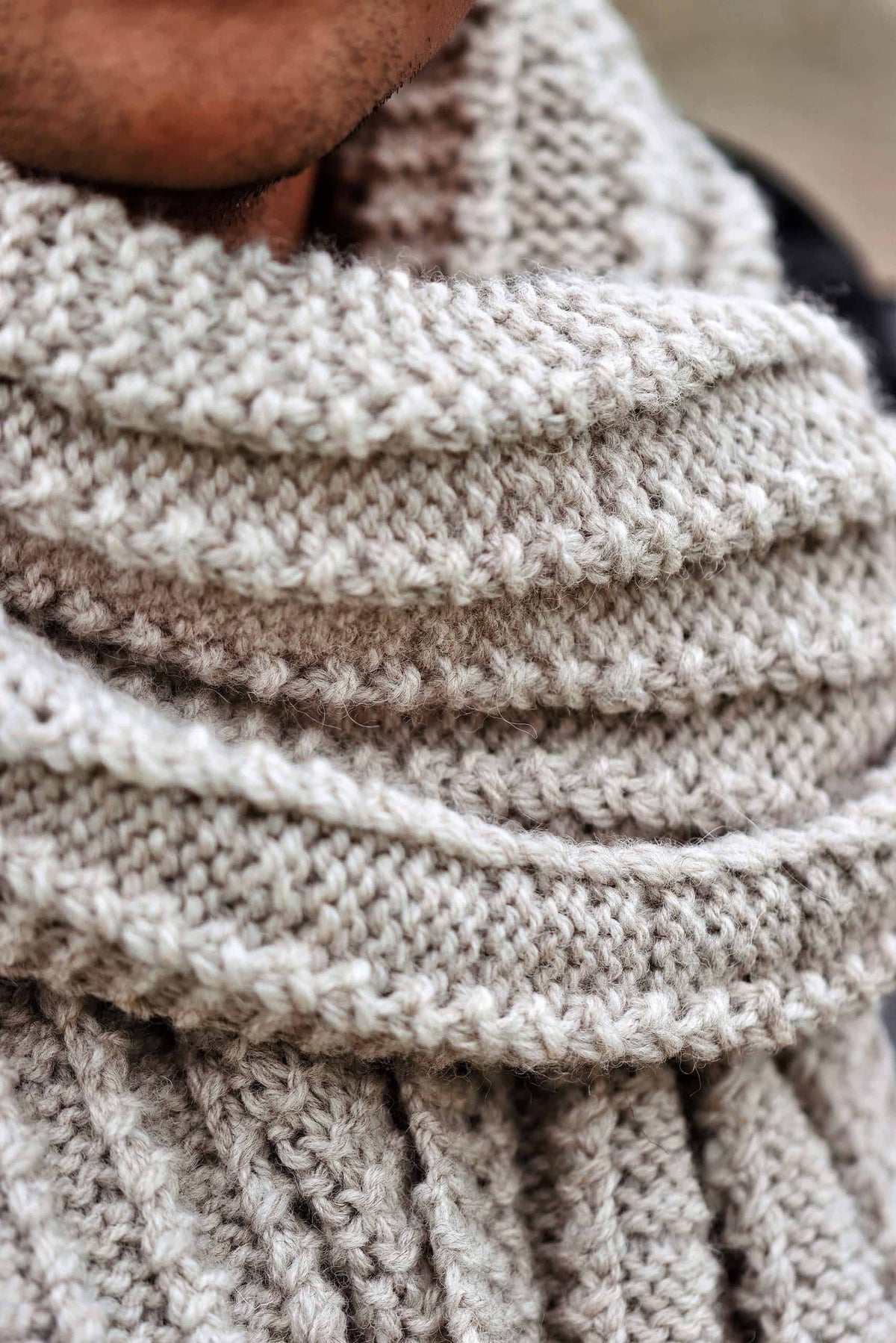 The Woodsman scarf knitting pattern styled with casual menswear