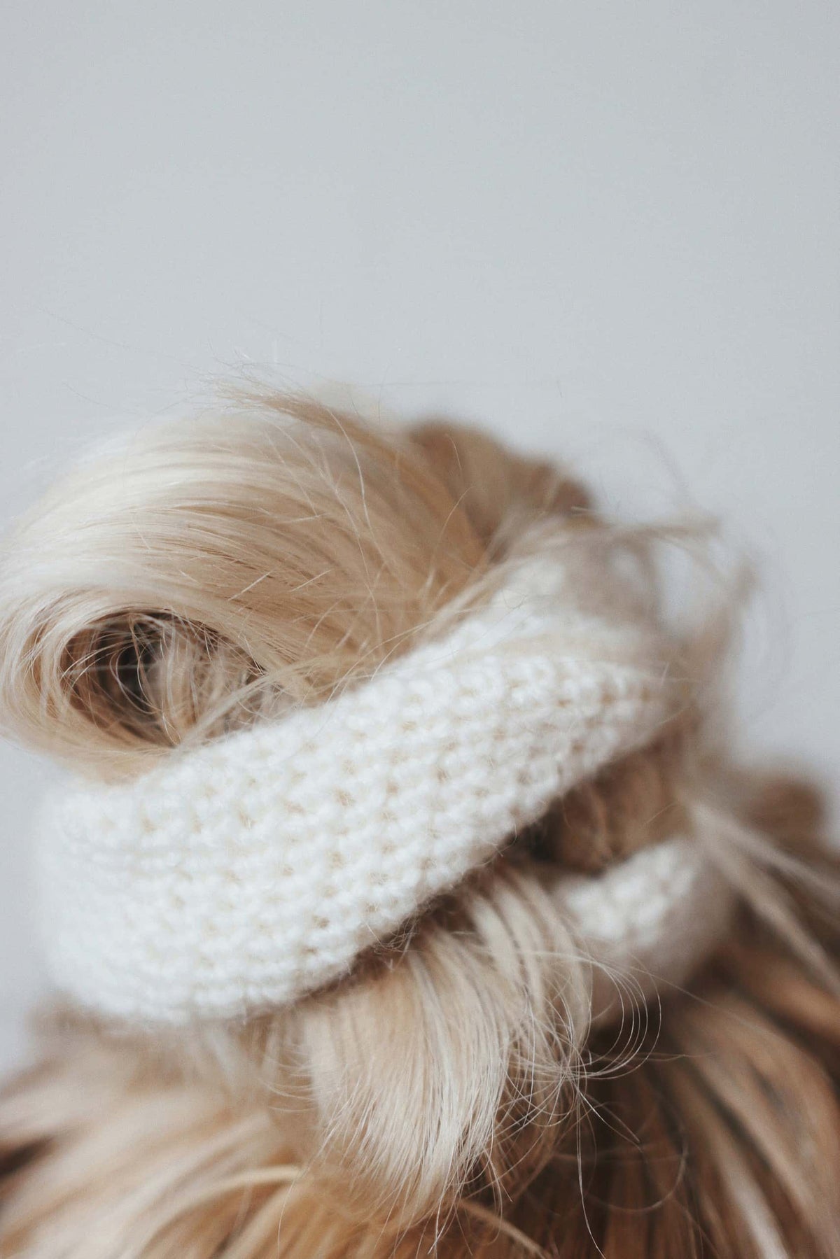 Easy crochet scrunchie pattern styled with minimalist aesthetic
